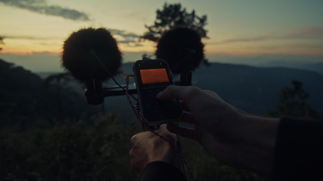 Sound Recording at Sunrise in Mountains