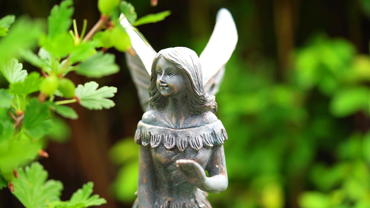 Cherub in the lush grass