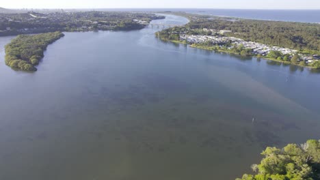 Tweed-River-With-Calm-Water-And-Lush-Vegetation-In-New-South-Wales,-Australia---aerial-shot