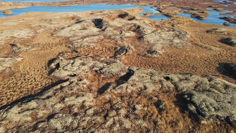 reveal shot of a huge crater and lake on iceland