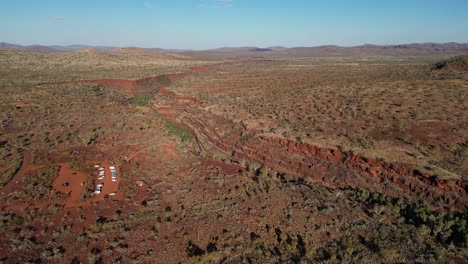 Canyon-view-of-Dales-Gorge-during-sunset-in-Karijini-National-Park-in-Western-Australia,-aerial-high-altitude