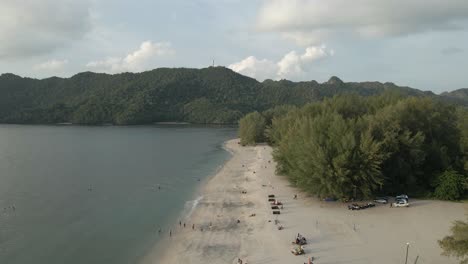 low flyover of sandy beach on malaysian island, tanjung rhu beach