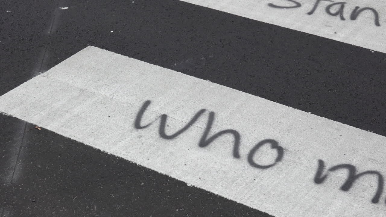 Street graffiti at homeless rights protest