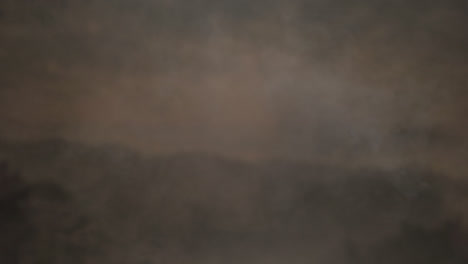 Fire-ball-with-smoke-moving-against-grey-background