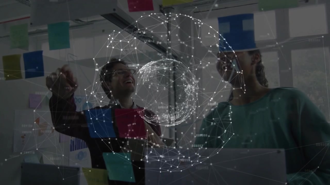 Man reaching placing blue sticky note pair moving notes under rotating sphere using laptop agreeing