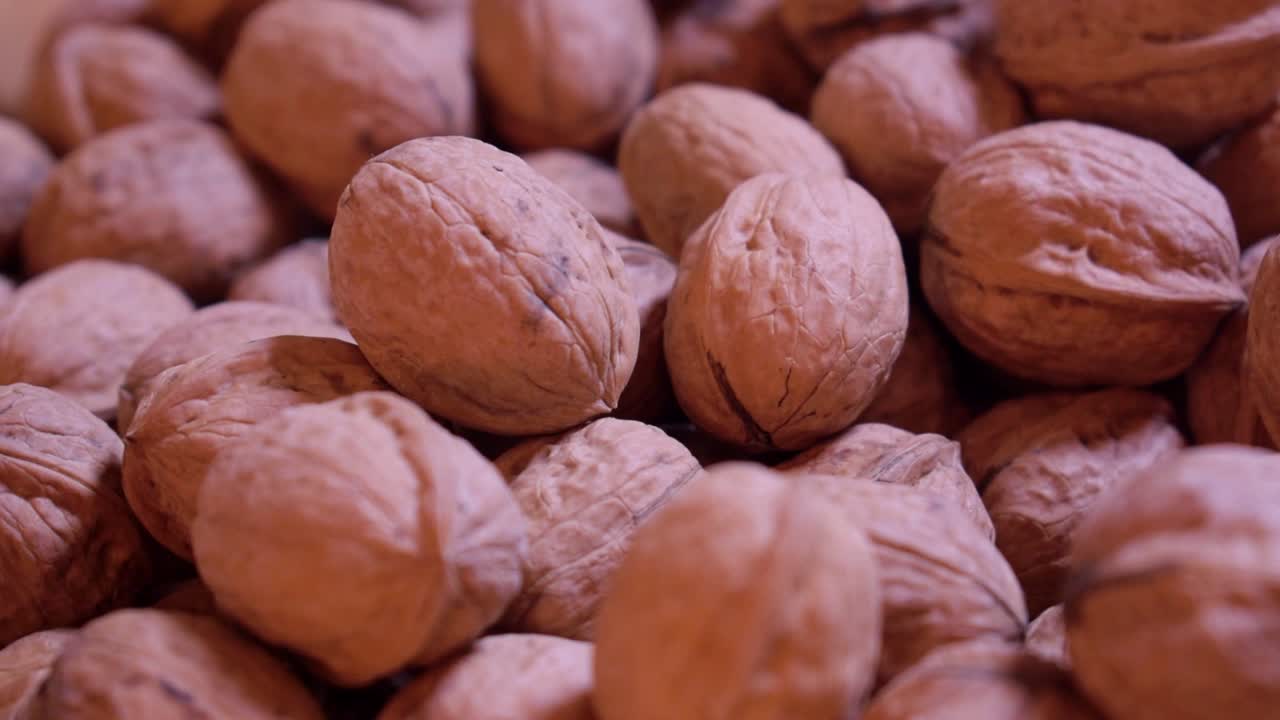 Dried walnuts in a wooden bowl-9