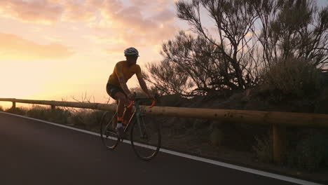 in slow motion, the biking athlete journeys along a mountain serpentine, marveling at the island's view—a manifestation of a healthy lifestyle