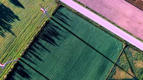 Wind-Turbines-On-Crop-Fields-in-the-Countryside-of-Brazil,-Aerial-Top-Down