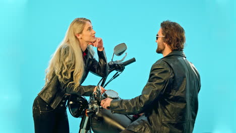 talking, motorcycle and couple on blue background