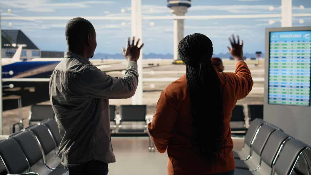 Relieved comic parents waving goodbye to daughter and sharing high-five