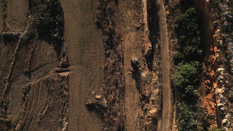 Drone-shot-of-Excavator-work,-Landscaping