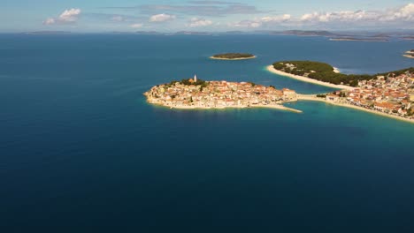 4k slow aerial tracking shot of the village of primošten, croatia