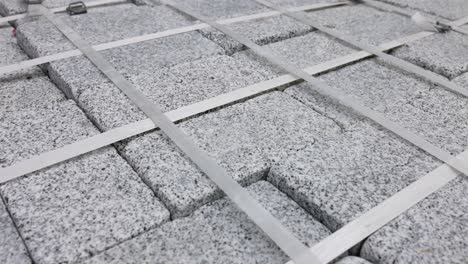 stack of grey granite paving stones