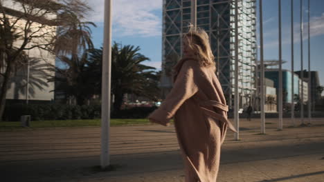 young woman walking outdoors.