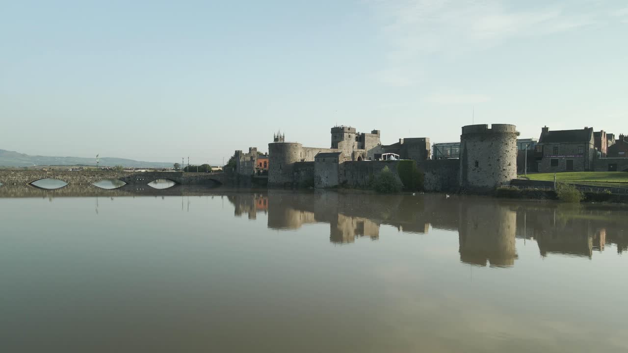 King John's Castle And Thomond Bridge On River Shannon In Limerick, Ireland. wide dolly-in shot