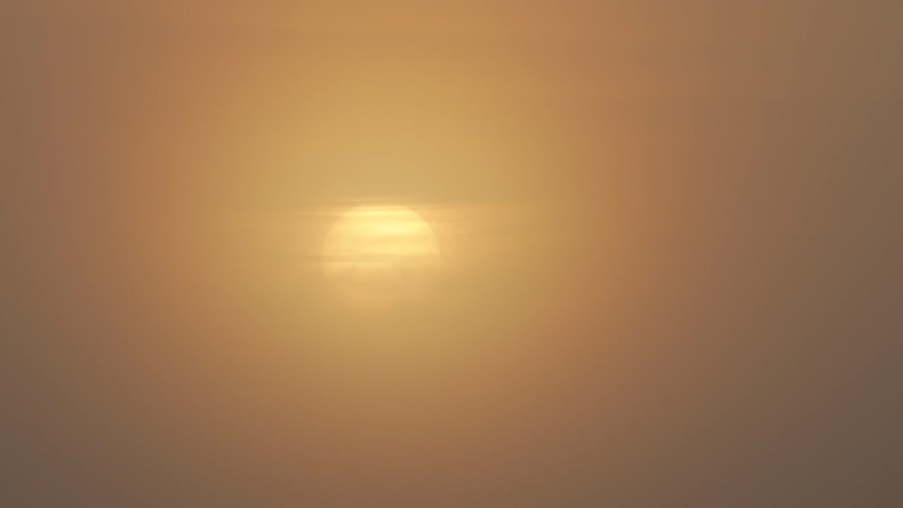 Sunrise Timelapse During Cloudy Foggy Hazy Morning, Sun Revealing Itself Behind Clouds Medium Shot, Maffra, Gippsland, Victoria, Australia