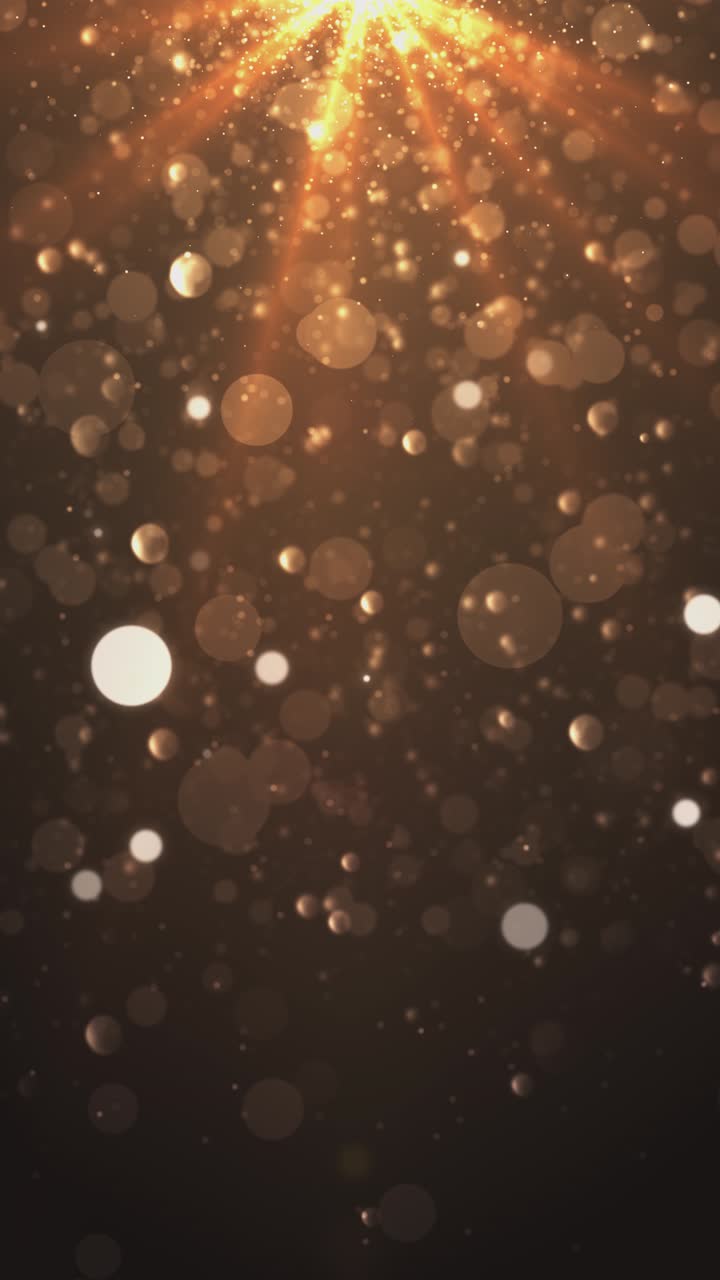 Golden glitter gold particles flying wind black background slow motion beautiful transition depth of