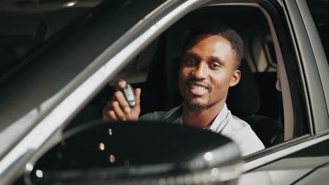 happy man with car keys