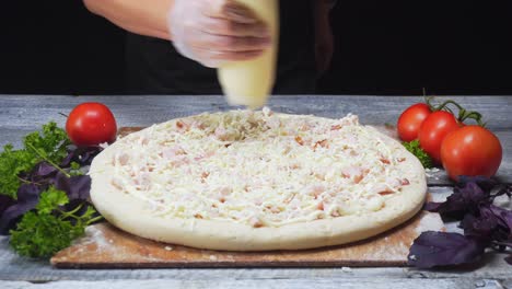 chef preparing a delicious pizza