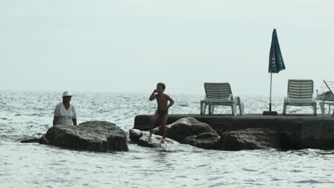 family enjoying a seaside day