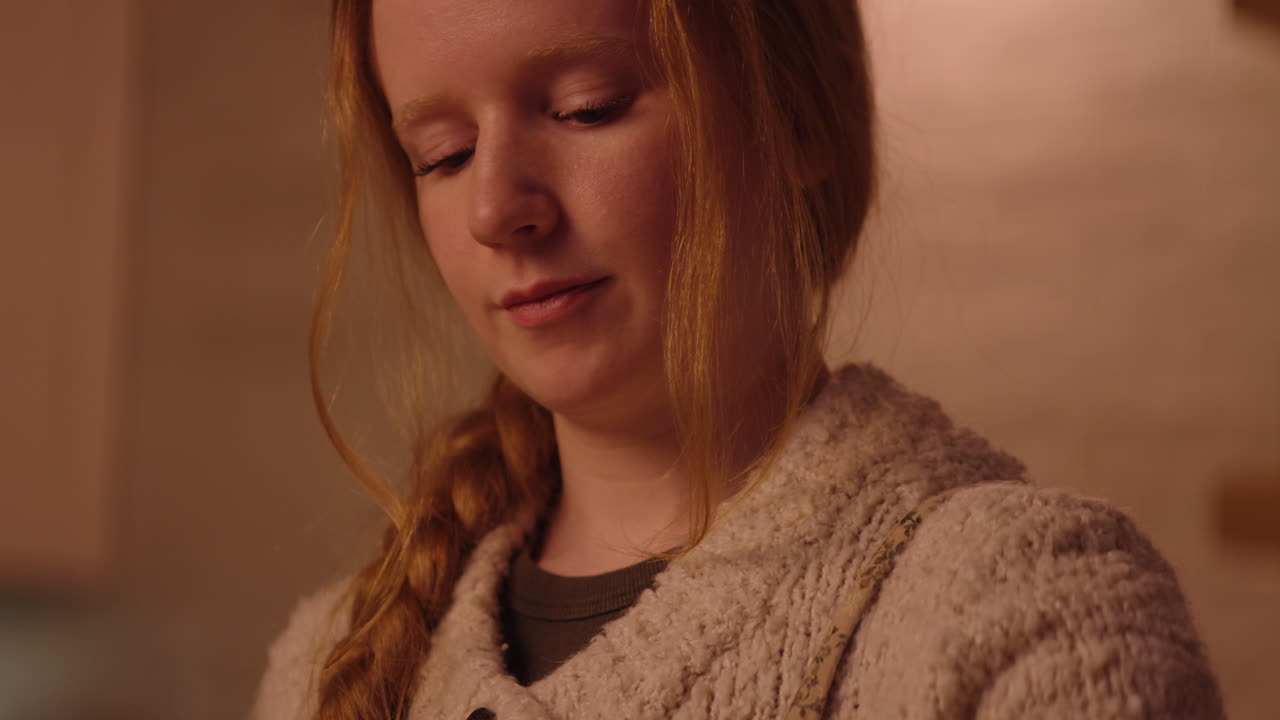 Teenage girl baking cookies