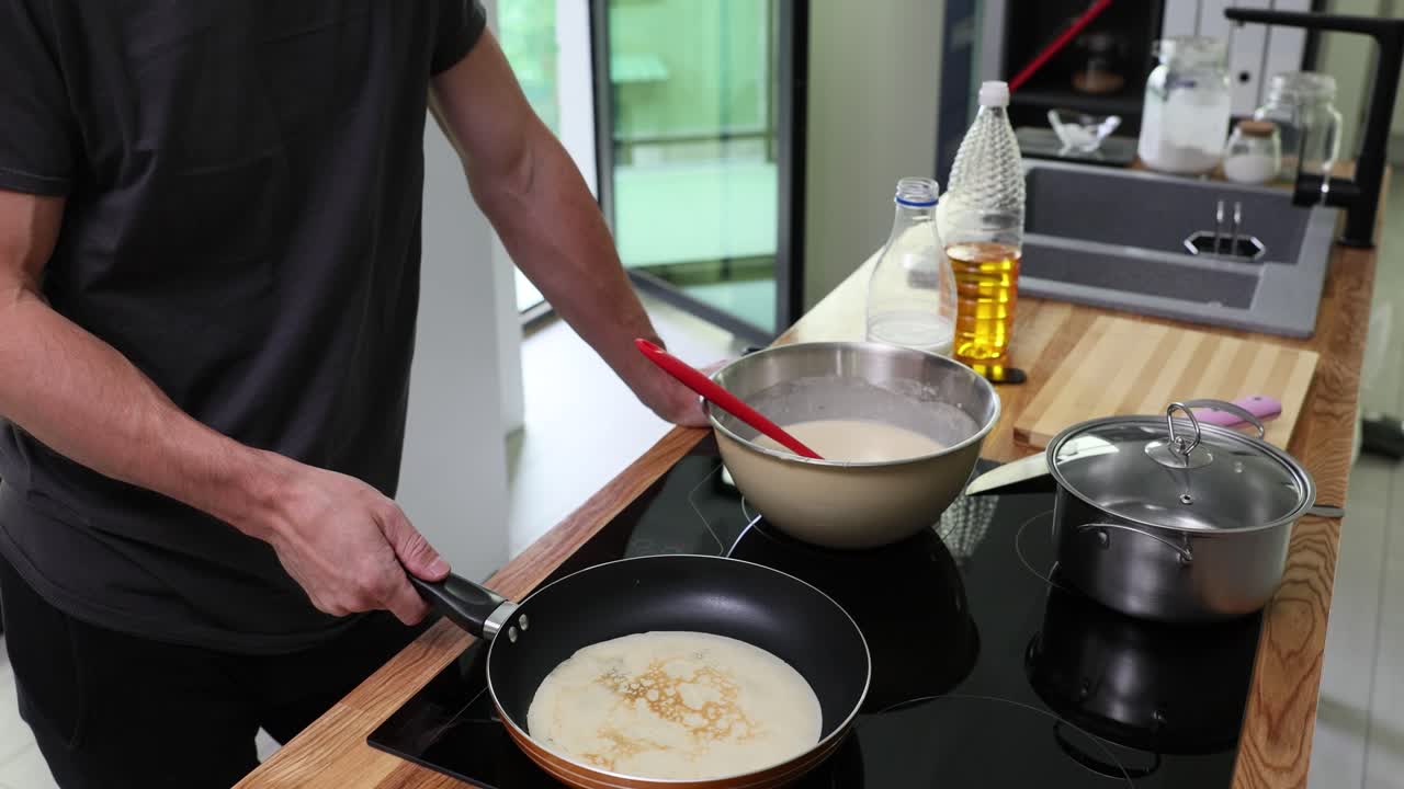 Cooking pancakes in the kitchen