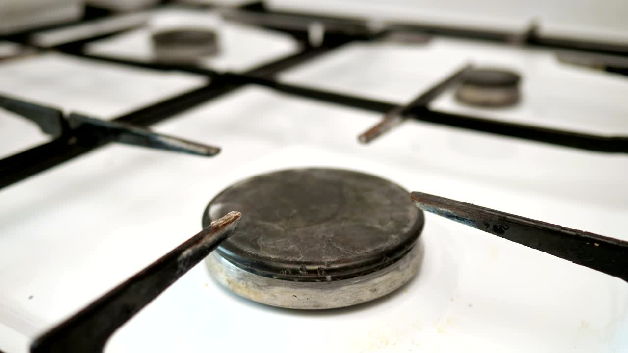 White gas cooker with hob included burning