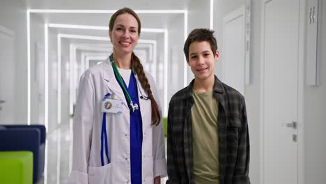 doctor and patient in hospital corridor