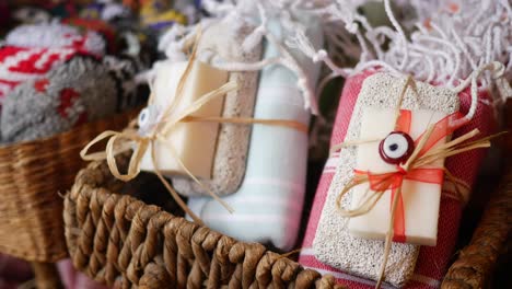 handmade soap and towels in a basket