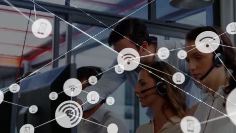 Animation-of-network-of-connections-and-icons-over-business-people-wearing-headsets