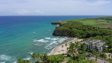 incredible view of the najayo beach in the caribbean, warm water, cliff in the background, beautiful afternoon