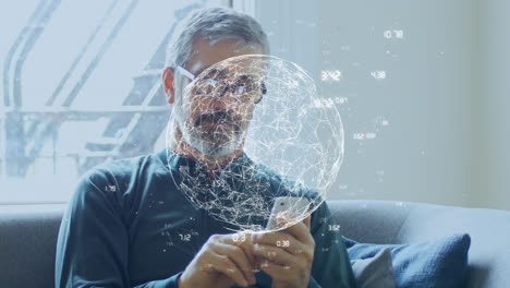 animación del globo con una red de conexiones sobre el hombre usando un teléfono inteligente