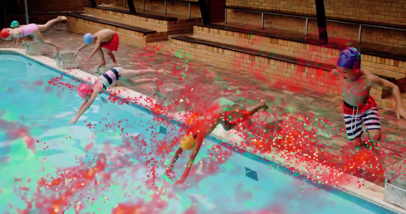 Crianças impulsionando-se dos blocos de partida para aula de saúde, mergulhando na piscina com rastros de confete rodopiantes.