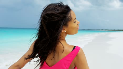portrait of happy african american girl on beach