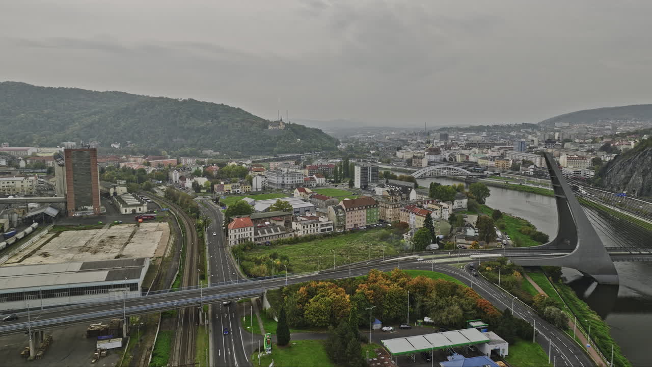 Usti nad Labem Czechia Aerial v2 establishing shot drone flyover Strekov towards Mesto capturing cityscape on the bend of Elbe river and hillside hotel větru&scaron;e - Shot with Mavic 3 Cine - November 2022
