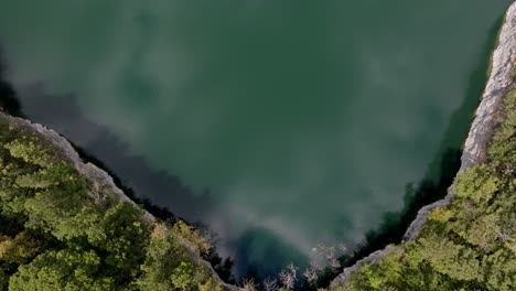 revealing drone shot of the westside reservoir park, bellwood quarry, atlanta green space, georgia