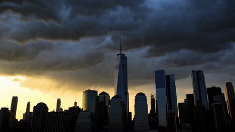new york city skyline under dramatic stormy clouds at sunset