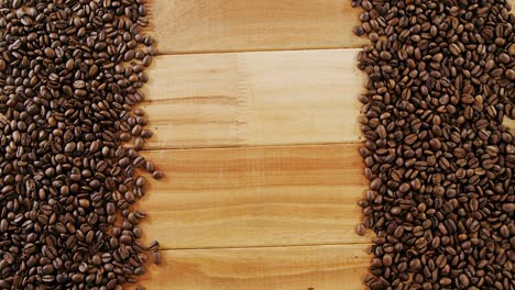 Roasted-coffee-beans-arranged-on-wooden-plank