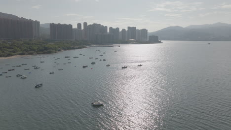 aerial shot of boats floating in hong kong waters, china