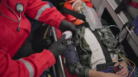 watch, pulse and hands of a paramedic