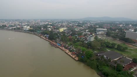 aerial shot of surat thani, river and city surat thani province, thailand