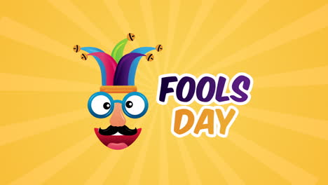 happy fools day card with crazy mask and buffoon hat