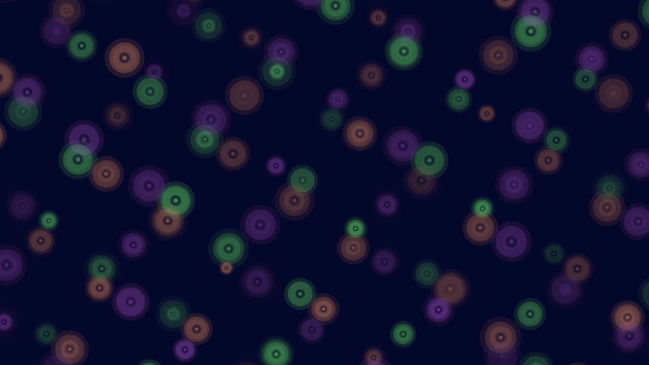 Vibrant, multicolored circles against a dark backdrop create a visually striking and dynamic pattern in this abstract image