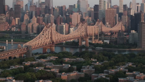new york city's queensboro bridge at sunrise