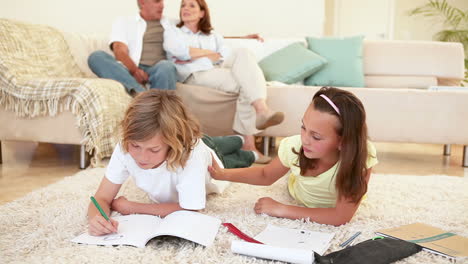 cute siblings coloring together