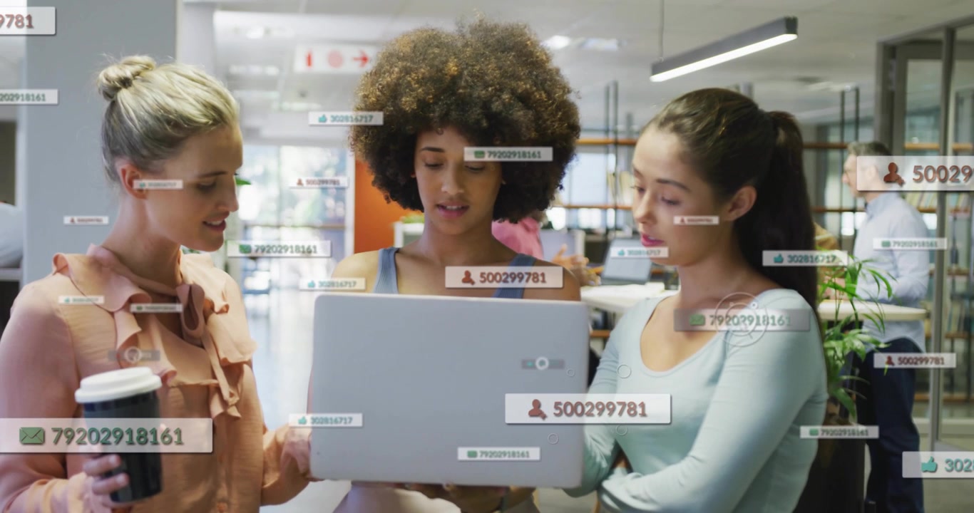 Central woman holding laptop and showing, causing AR labels grouping near heads and laptop for tech