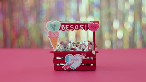 cute kissing booth miniature with confetti, valentines day decoration