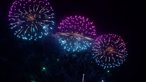 colorful fireworks at night sky, new year or national holiday celebration, full frame