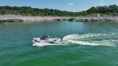 surfing behind a boat at lake travis