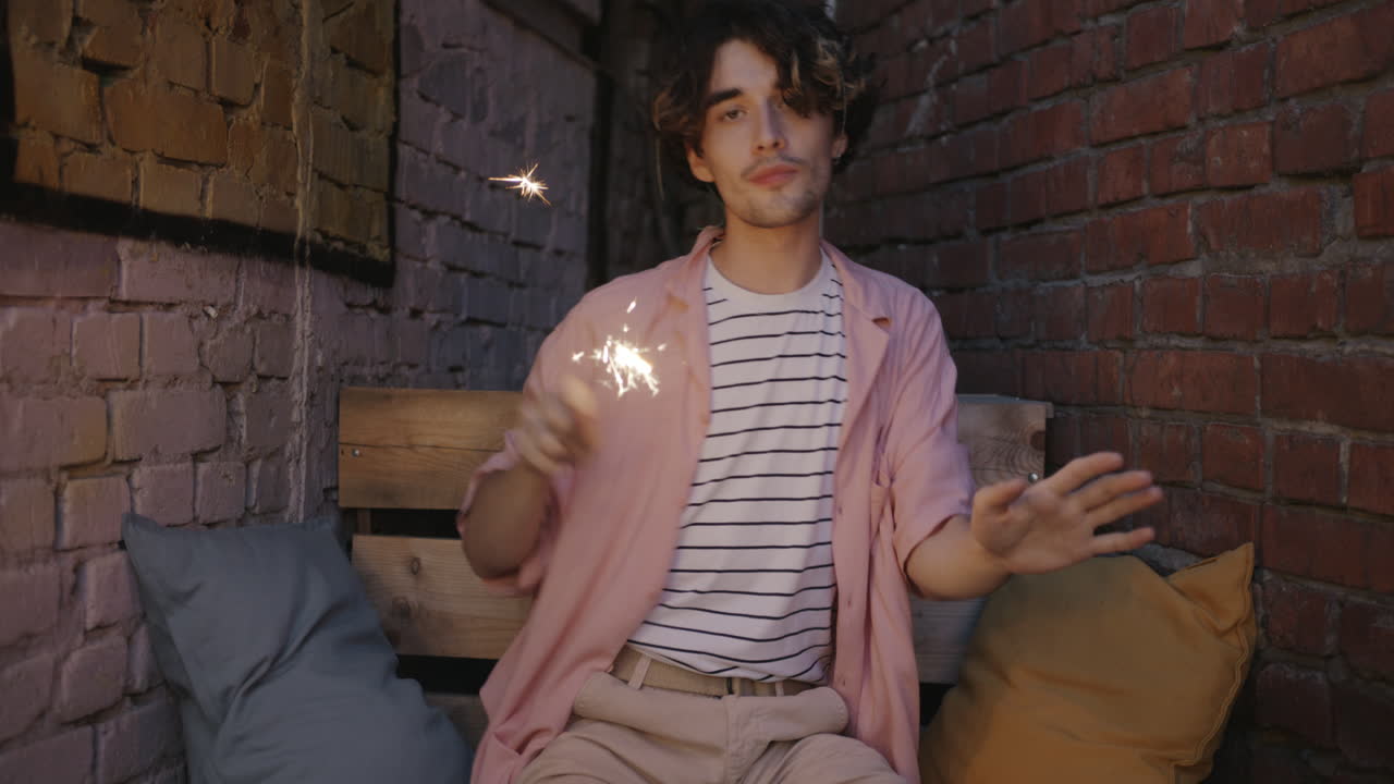 Man Celebrating with Sparkler